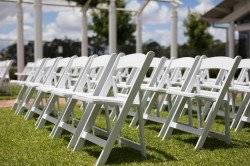 AdobeStock 482142239 1695574986 White Padded Folding Chair